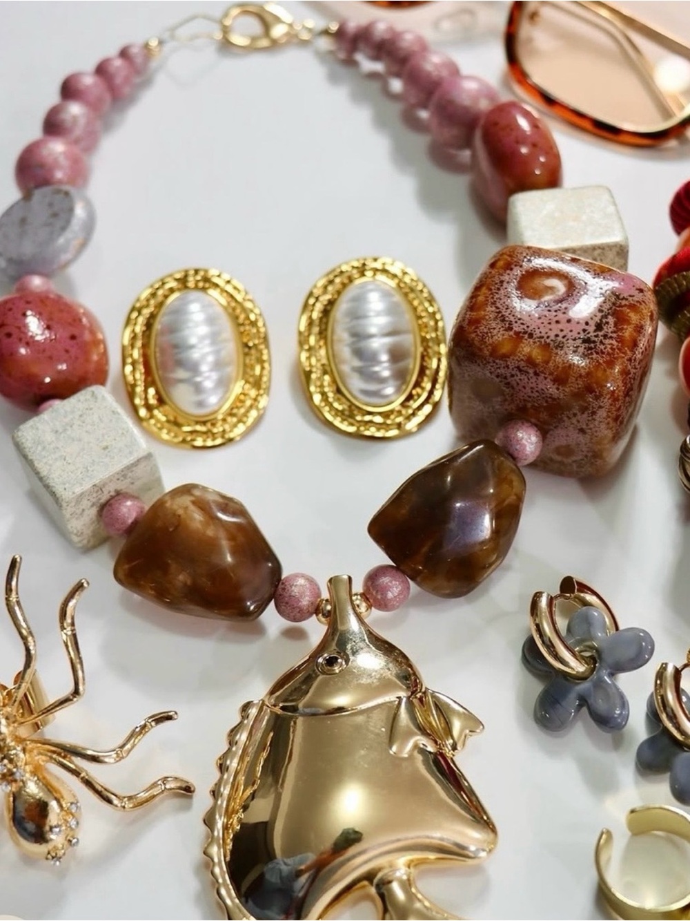 Handcrafted Pink and Brown Bead Necklace with Gold Fish Pendant